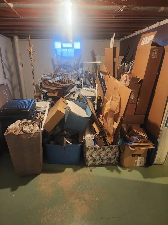 Roll-off dumpster container at job site for 4 Yard Dumpster Rental in Swansboro